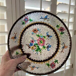 Vintage plique a jour cloisonné plate on wooden stand.